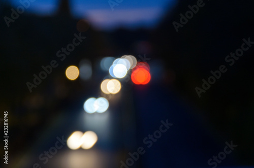 Defocused bokeh of car headlights at night © michaelheim