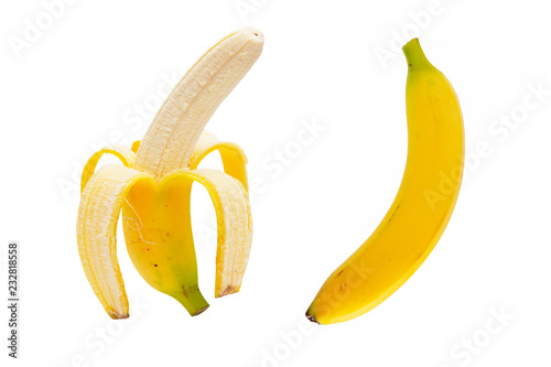 two peeled bananas isolated on white with reflection under them on surface