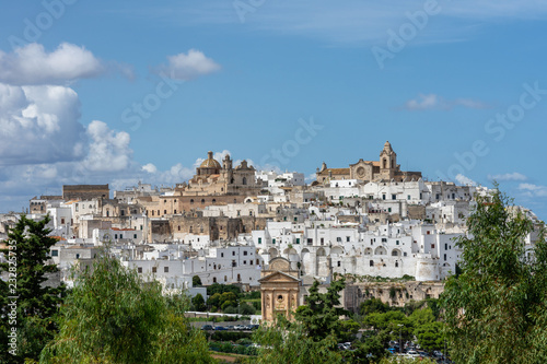 A cityscape of Ostuni, Italy on a summer day