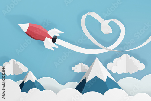 Paper art style of Heart ribbon with Rocket launch in the sky, Create custom greeting cards given on special occasions such as Happy new year or valentine day, 3D rendering design.