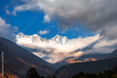 View of Mount Everest, Lhotse and Nuptse with clouds at sunset from Tengboche, Everest Base Camp trek in Nepal