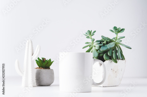 white mug mockup in a styled setting with a white background photo