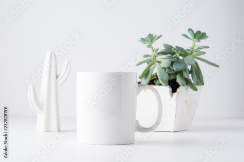 white mug mockup in a styled setting with a white background photo