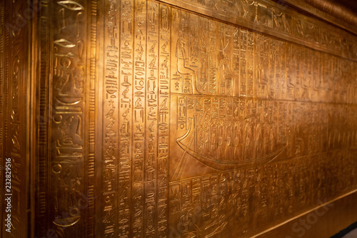 Tomb of ancient Egyptian pharaoh king Tutankhamen covered with carved out hieroglyphs