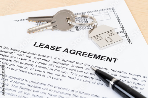 Rental agreement paperwork; document is mock-up photo