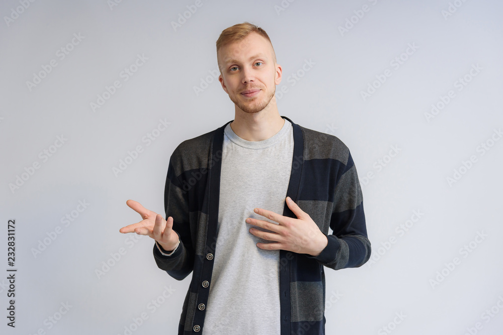 custom made wallpaper toronto digitalStudio portrait concept of a smiling young man talking on a white background.