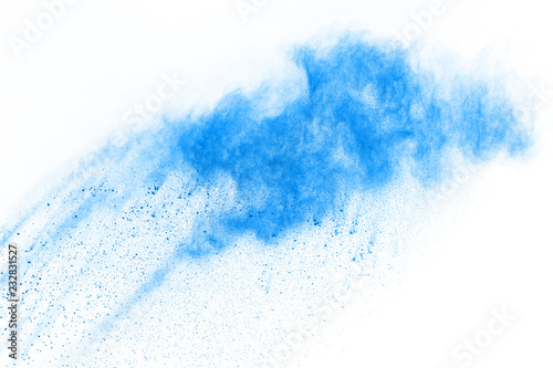 Blue powder explosion on white background. Colored cloud. Colorful dust explode. Paint Holi. © kitsana