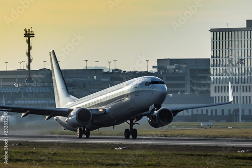 White Boeing 737 taking off at dusk/dawn 