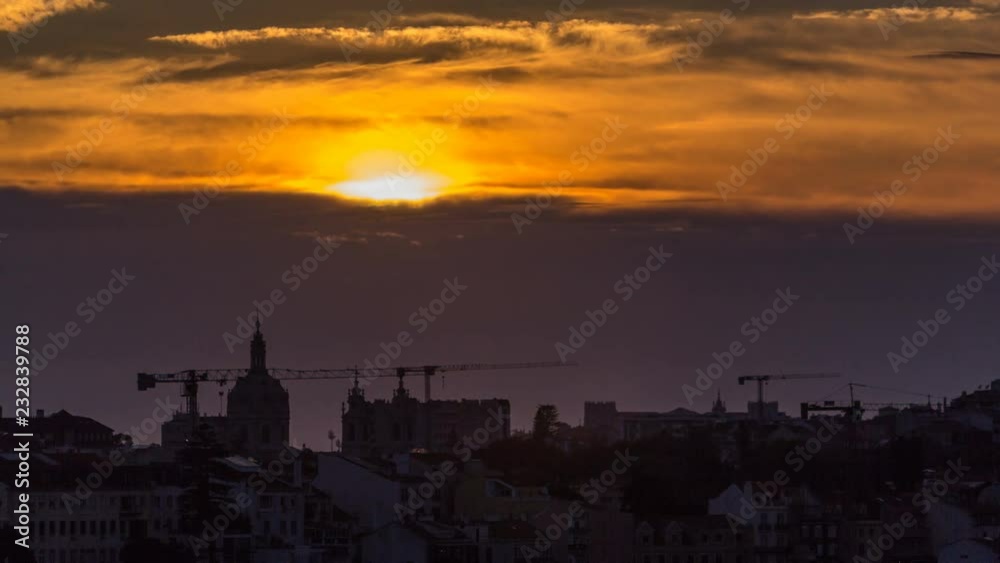 Lisbon at sunset aerial panorama view of city centre with red roofs at Autumn evening timelapse, Portugal Lisbon at sunset aerial panorama view of city centre with red roofs at Autumn evening timelapse, Portugal