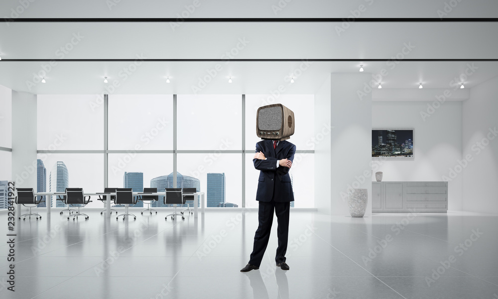Businessman with an old TV instead of head. Businessman with an old TV instead of head.