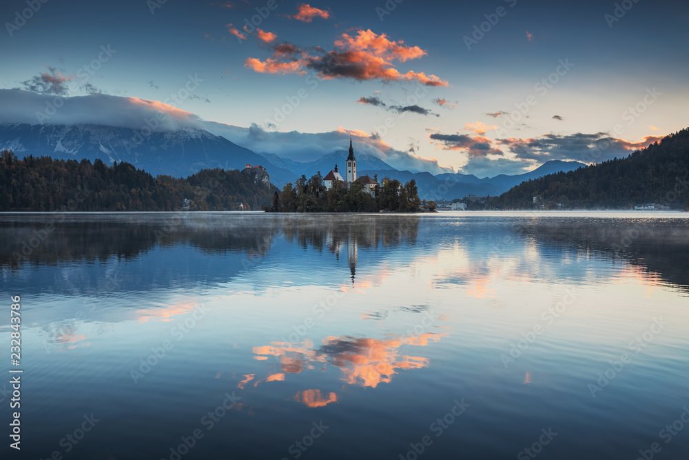 Lake Bled with St. Marys Church of the Assumption on the small island; Bled, Slovenia, Europe.