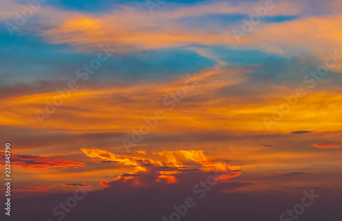 Landscape of the evening sky with light orange and blue. Summer Beauty