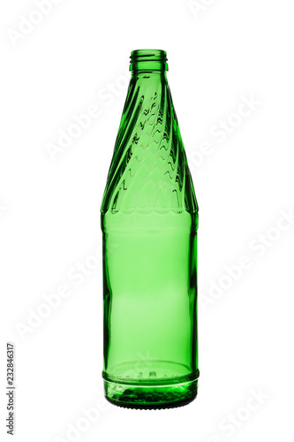 empty glass bottle of green color on a white background