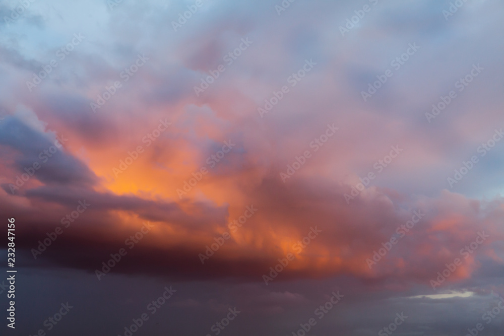Amazing orange sunset through clouds 0147