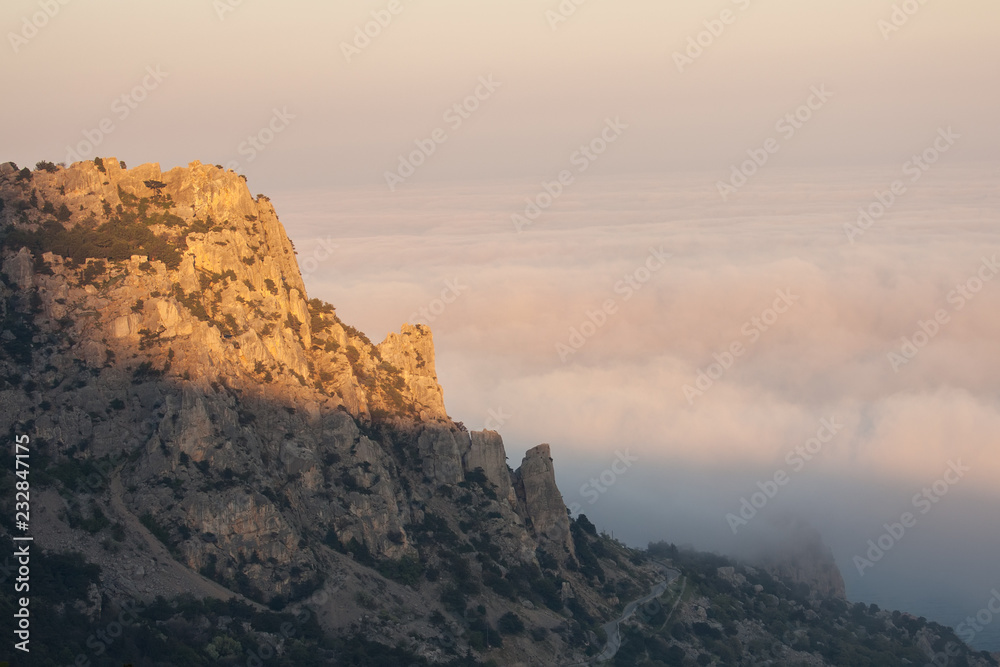Mountain Cat in the sunset and heavy fog. The Town Of Simeiz. The Peninsula Of Crimea. Black Sea.