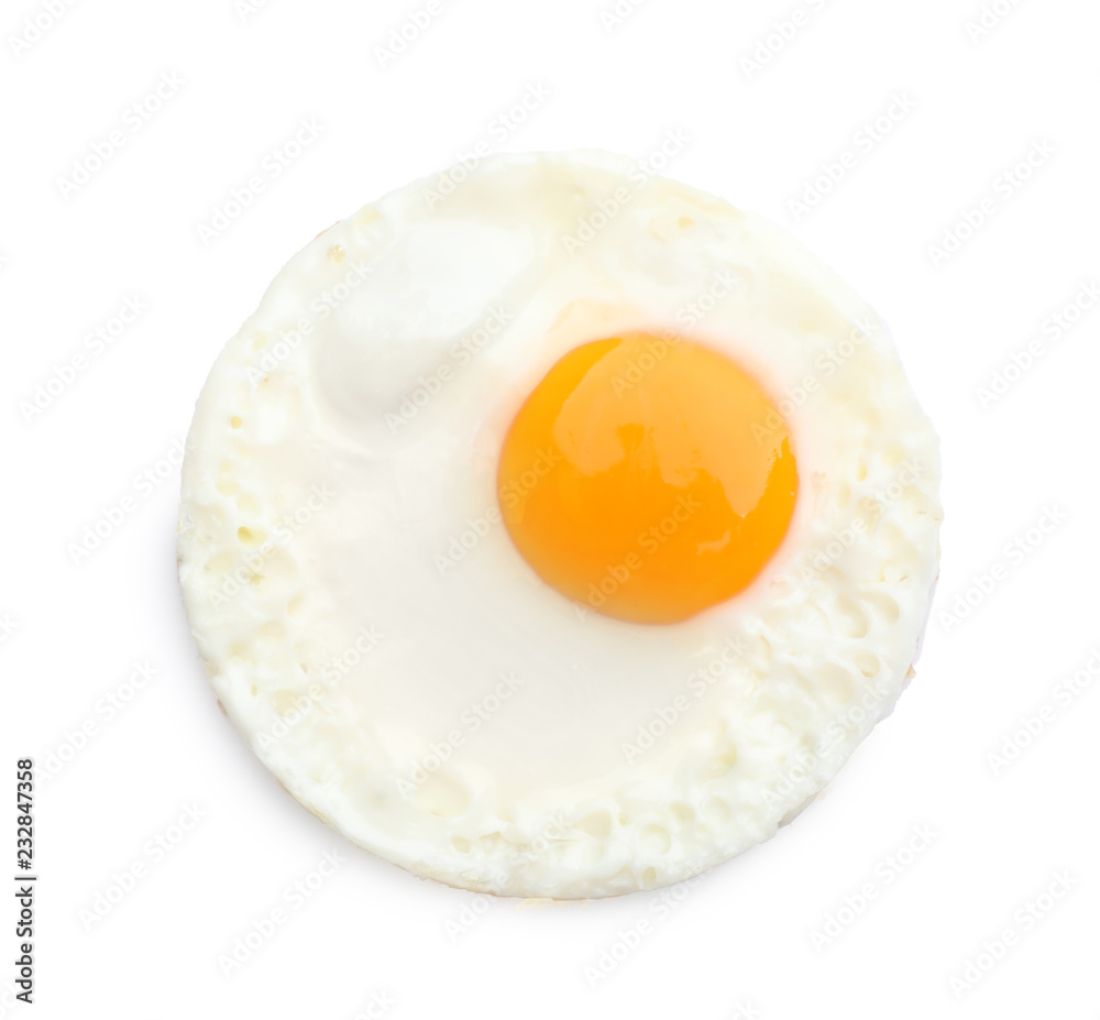 Fried sunny side up egg on white background, top view Fried sunny side up egg on white background, top view