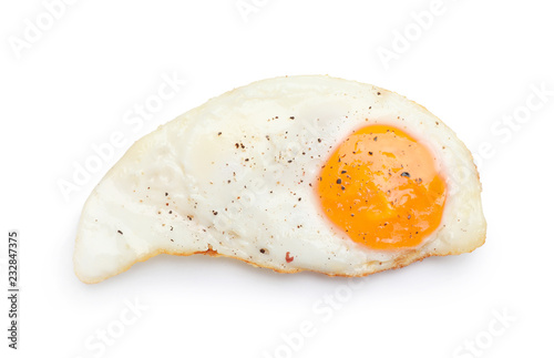 Fried sunny side up egg on white background, top view