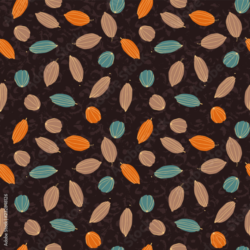 Colorful stylized cacao pods on textured ground seamless vector pattern background.