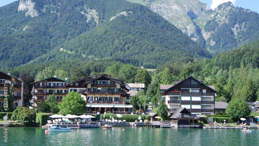 Beautiful austrian houses on the coast of the Wolfgangsee lake