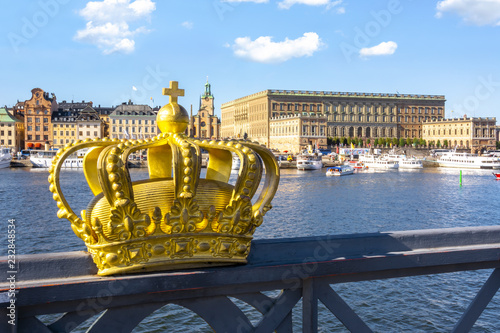 Photography Stockholm old town (Gamla Stan) with Royal palace and Royal crown, Sweden
