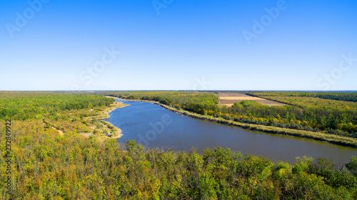 Aerial view on the lake in the middle of the forest