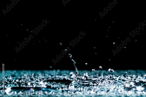 water drops on the surface background rain splashing water crown