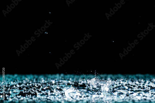 water drops on the surface background rain splashing water crown
