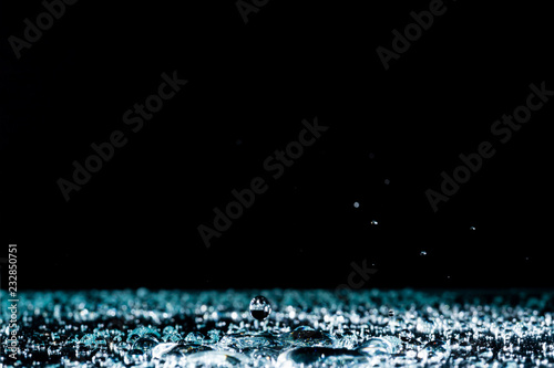 water drops on the surface background rain splashing water crown