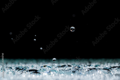water drops on the surface background rain splashing water crown
