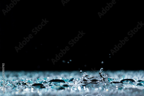 water drops on the surface background rain splashing water crown