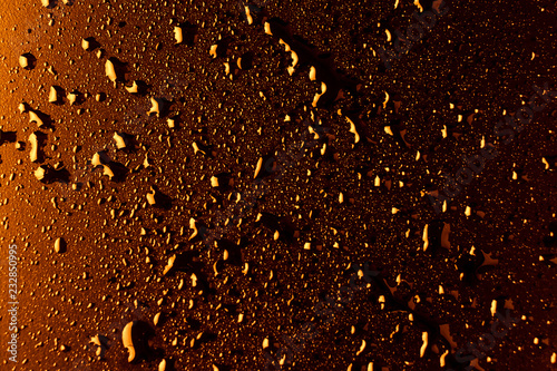 water splash golden hue texture drops background