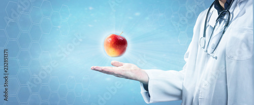 Arzt mit Apfel  photo