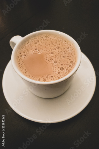 Tea in a white cup an indian special drink
