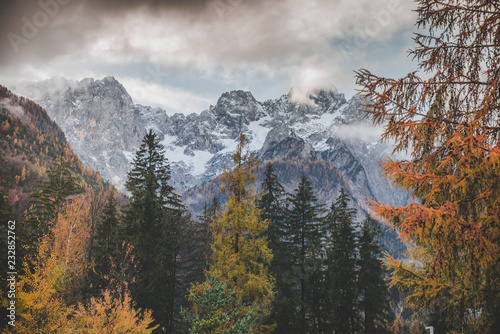 Colorful autumn in Alps. Hiking, adventure, concept photo