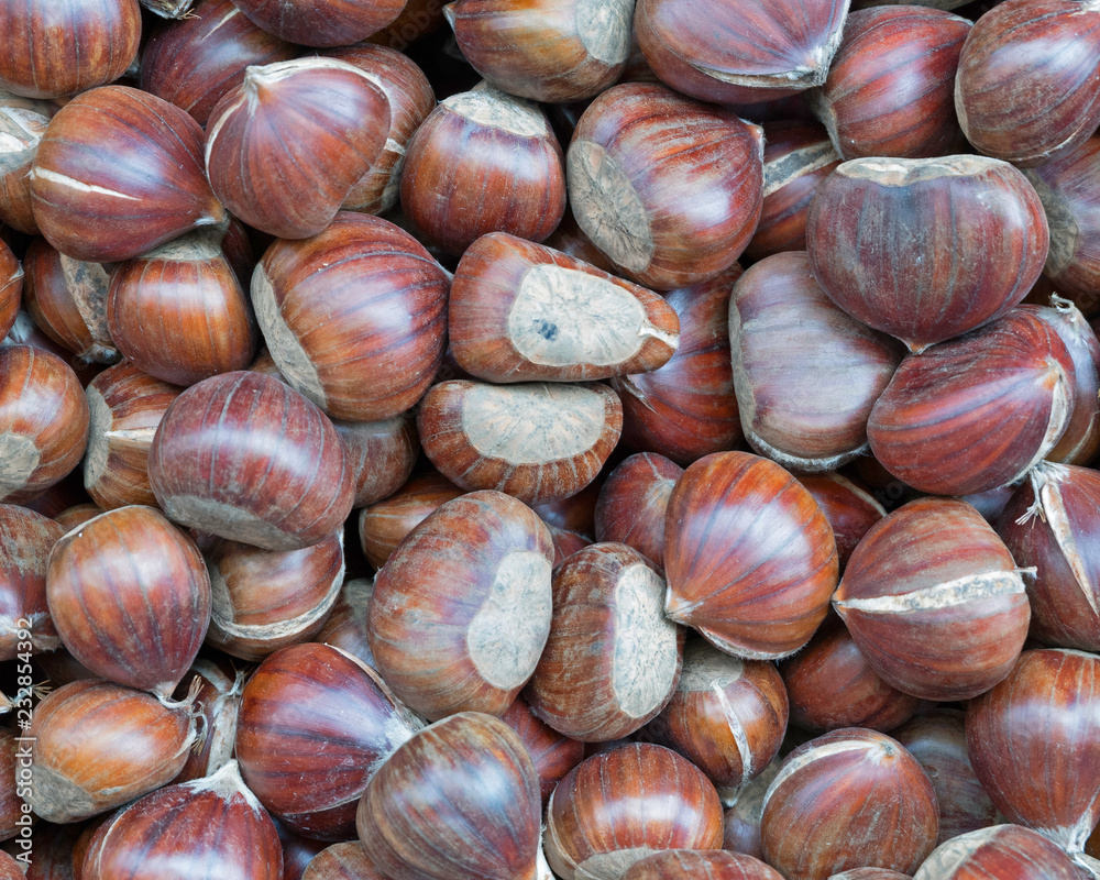 organic chestnuts top view, seamless natural background organic chestnuts top view, seamless natural background