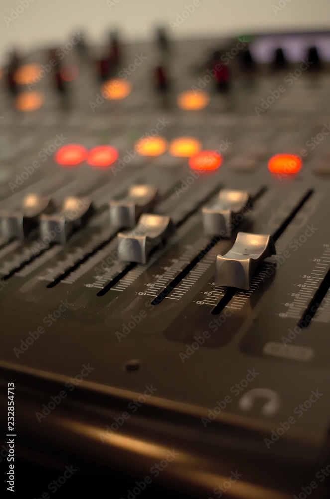 A shotgun microphone in a recording studio A shotgun microphone in a recording studio