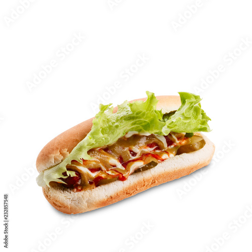 Hot dog with lettuce, ketchup and musturd