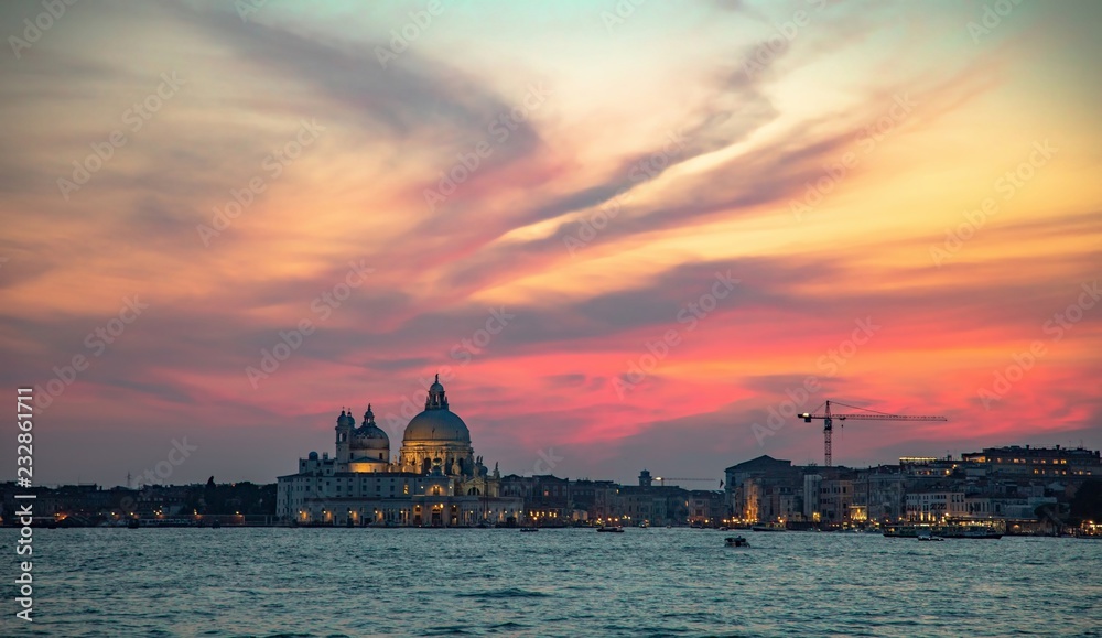Italy beauty, evening sky with cathedral Santa Maria della Salute in Venice, Venezia