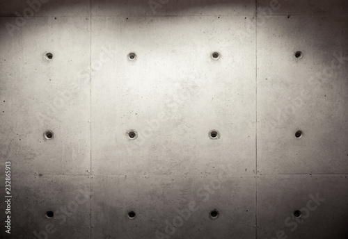 Gray concrete wall with spot lights