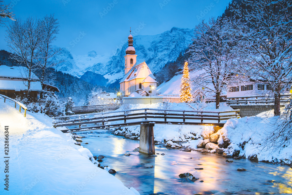 Fototapeta premium Church of Ramsau in winter twilight, Bavaria, Germany