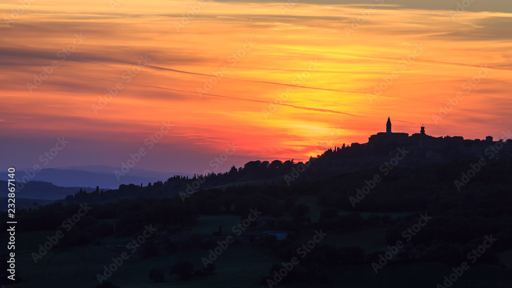 Sillhouette of the city at sunset, Italy. Travel Europe.