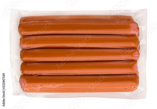 Sausages in vacuum packaging on a white background. A pack of sausages from a store isolated on a white background.