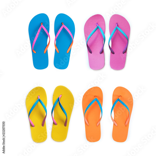Set Of Yellow Orange Pink Blue flip flops isolated on white background. Top view