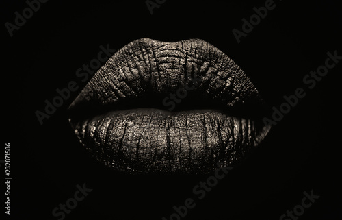 Vászonkép Seductive female full lips on black background