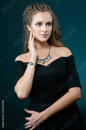 Portrait of young beautiful woman with jewelry © sasapanchenko