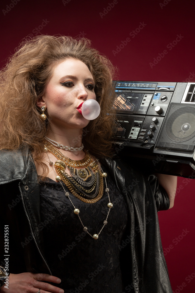 Girl with boom box and bubble gum, 1980's style