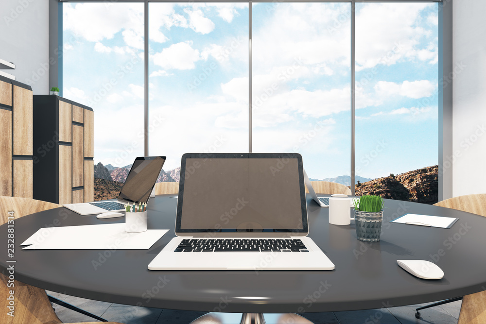 Meeting room with laptop