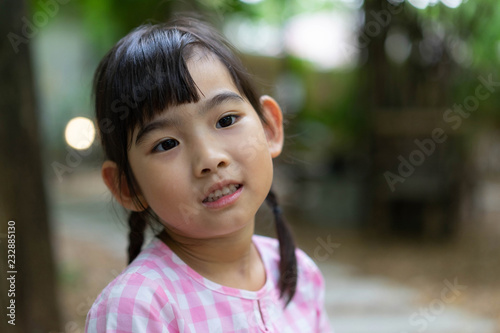 Portrait Asian kid little girl smiling happy