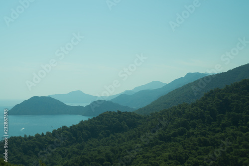 Landscape with the mountains and islands. Seascape background © maxkolmeto