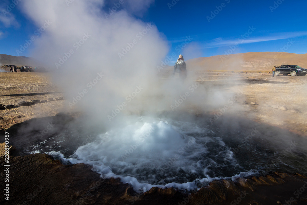 El Tatio Geysers at Atacama desert, amazing thermal waters at 4500 masl inside the Andes a place with an awe geothermal activity below the ground. Volcanic activity at Atacama , Chile